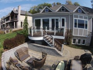 outdoor patio with bent glass rail 