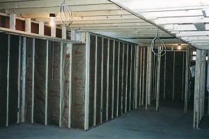 Unfinished basement framing by Miles Bradley