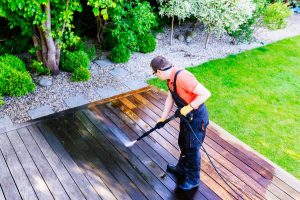 Deck cleaning with power washer